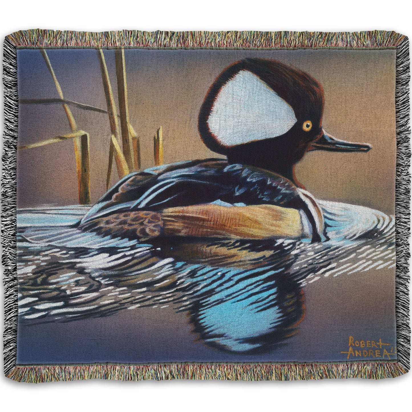 A woven throw blanket decorated with the design of a hooded merganser duck, floating on the water with its reflection rippling below.