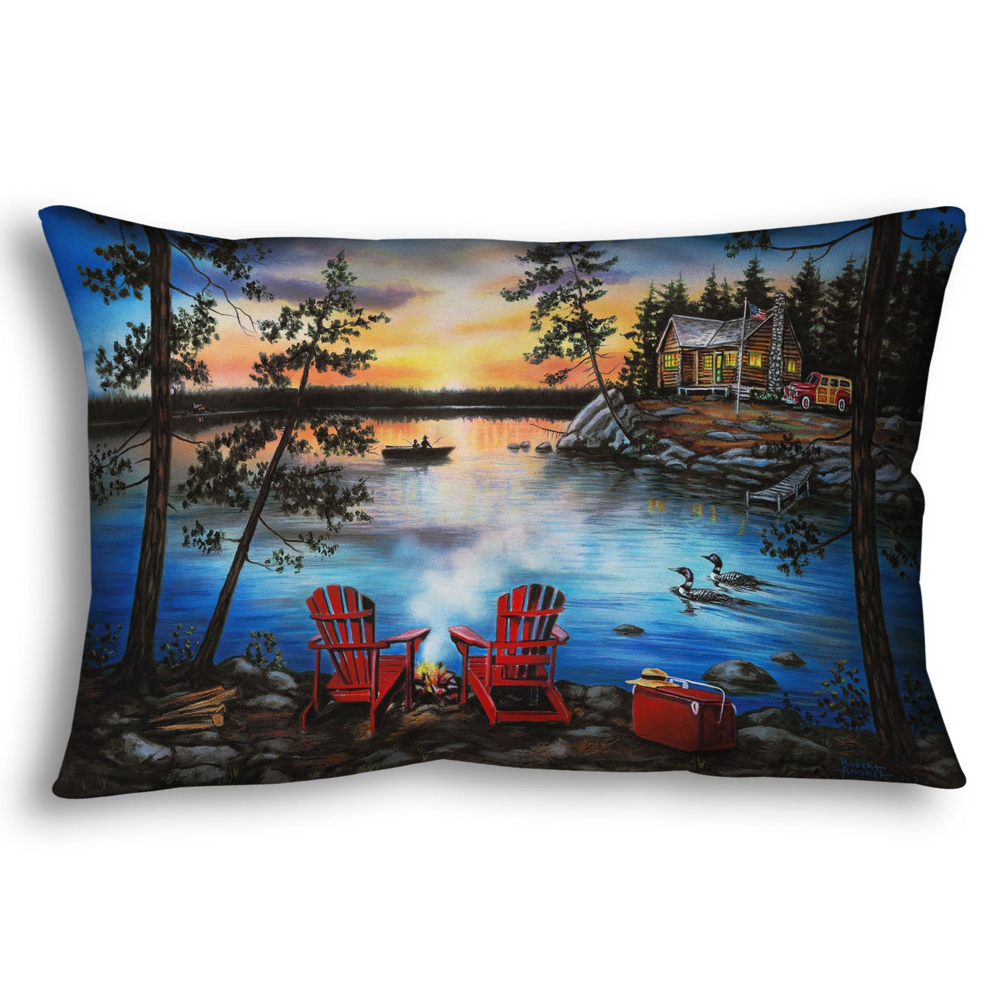 A throw pillow designed after a painting of a lake at sunset, with a campfire in the foreground. Two loons drift across the water, as well as two fishers.