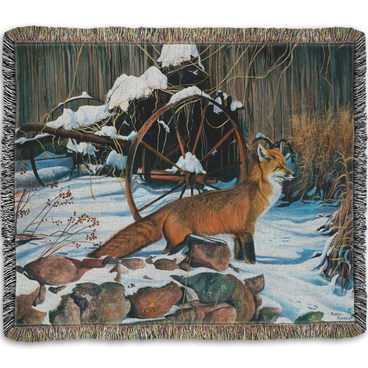 A woven blanket designed with a painting of a red fox in the winter snow. It is standing by some old farming equipment, grasses, and stones.