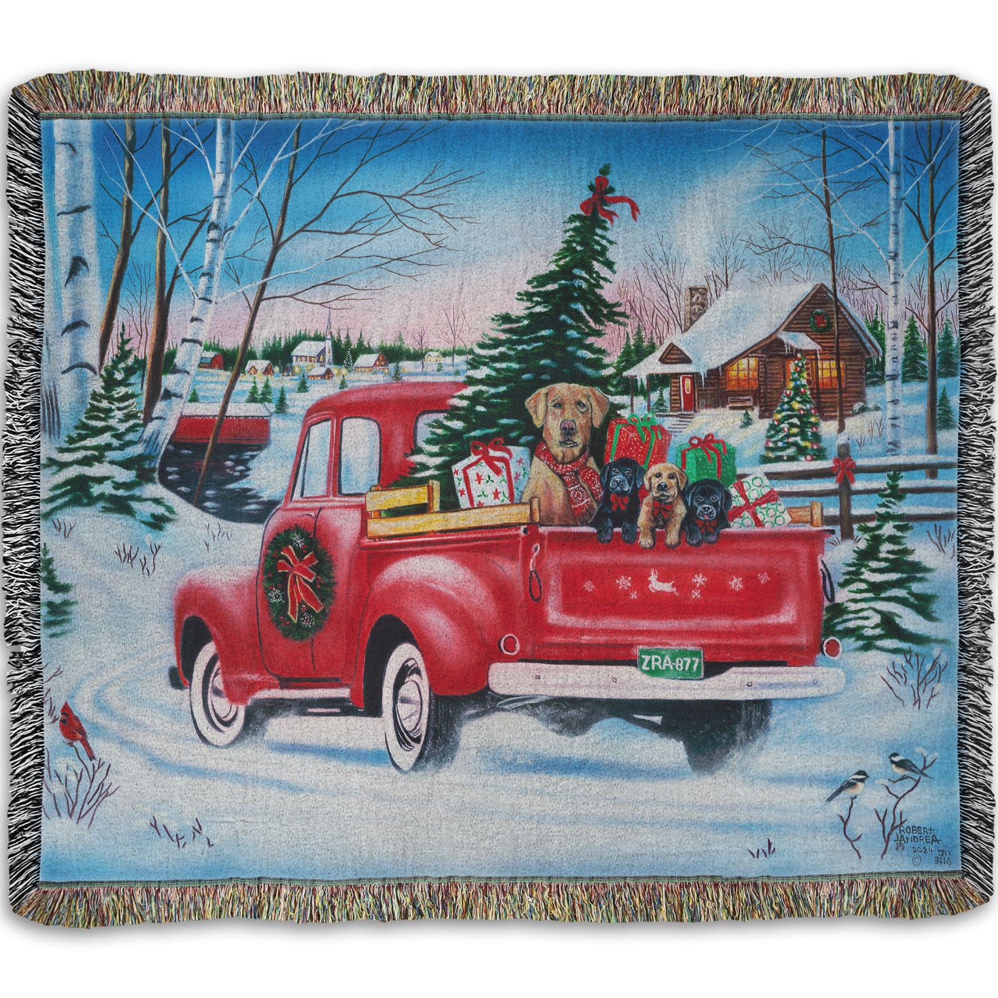 Festive woven blanket with a red truck carrying a Christmas tree, puppies, and presents in a snowy village scene.