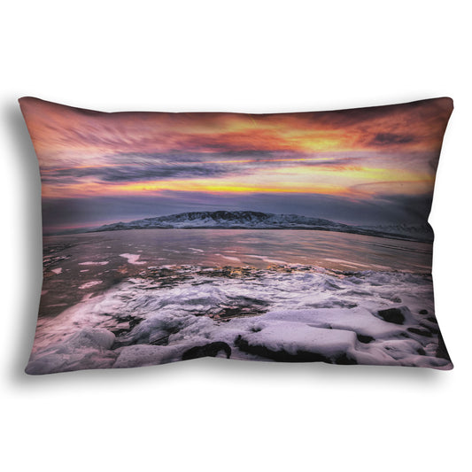 A throw pillow designed with the photo of a sunset over an icy lake at Mount Timpanogos, Utah, one Christmas evening.