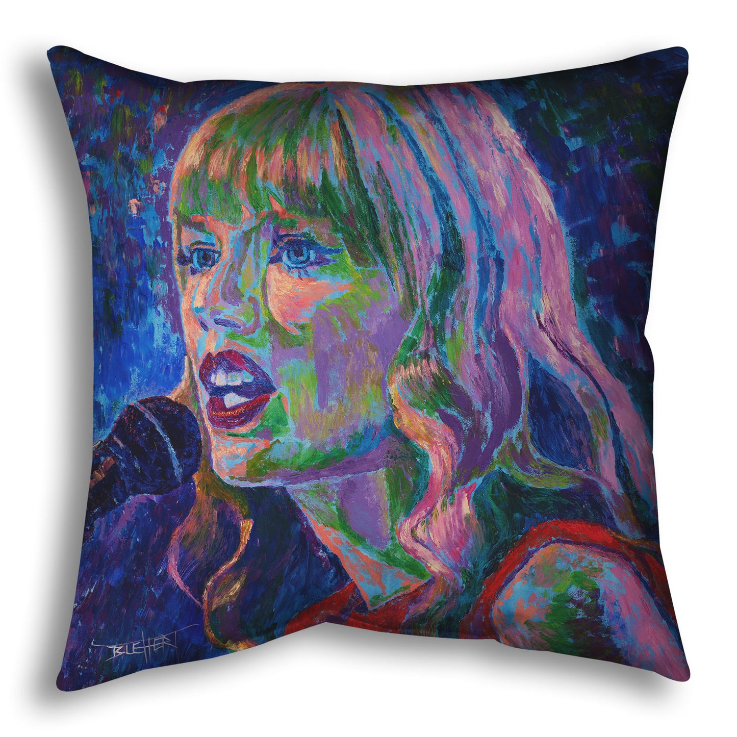 Decorative pillow with a colorful portrait of Taylor Swift singing into a microphone.