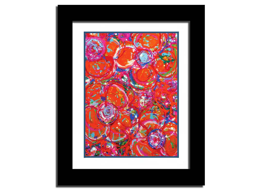 A drip painting of a cluster of abstracted flowers created with splatters of orange, red, and pink with accents of green, blue, yellow, and purple. Printed on paper, matted, and framed.