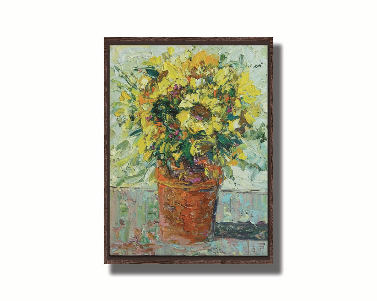 An expressive painting of an orange clay pot full of yellow sunflowers. Printed on canvas in a float frame.