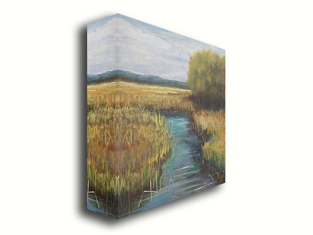 A painting of a stream running through fields of yellow grasses, with clusters of trees to one side. Printed on canvas.