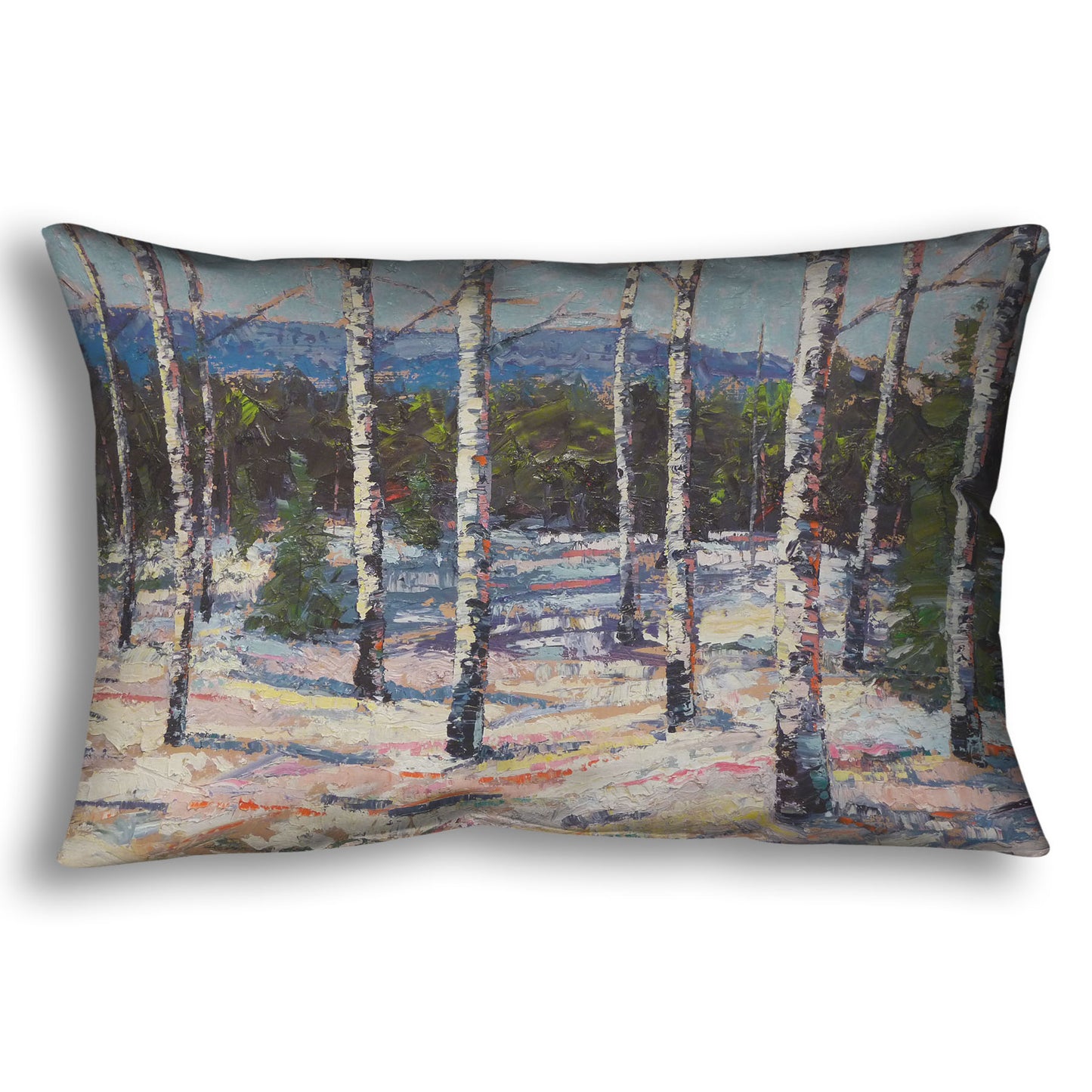 Throw pillow printed with a painting of birch trees in a snowy landscape with mountains in the background.