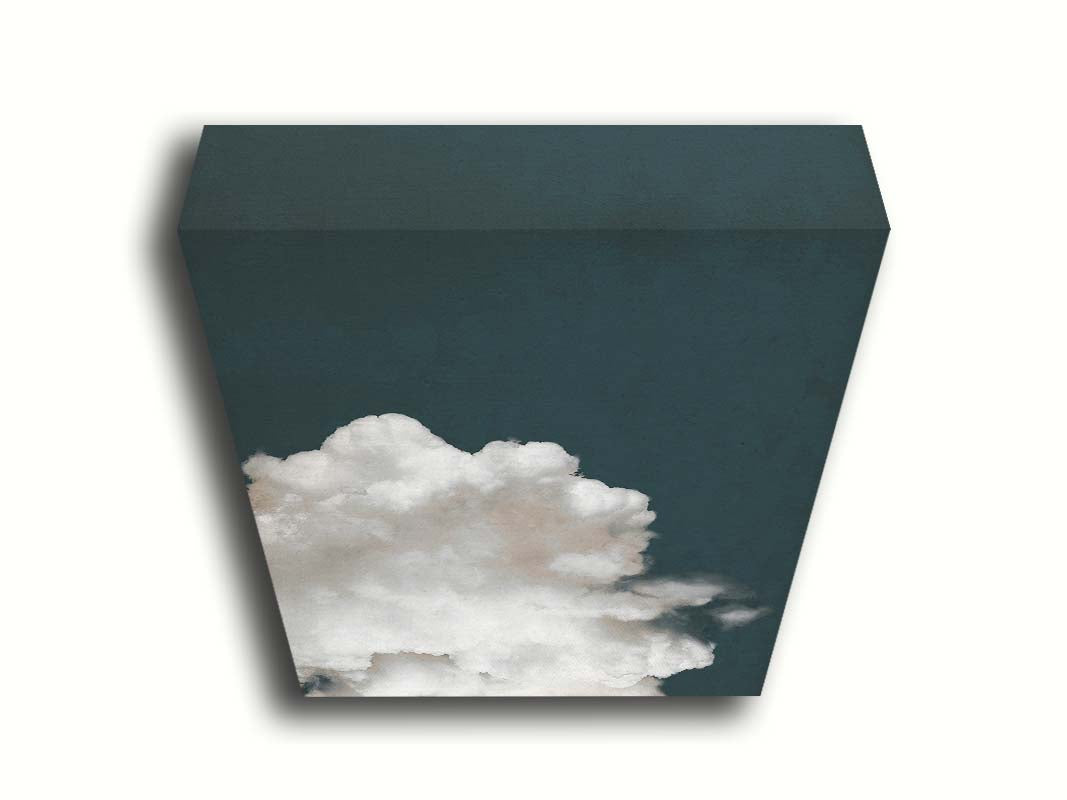An edited photo of a fluffy white cloud against a deep navy blue background. Printed on canvas.