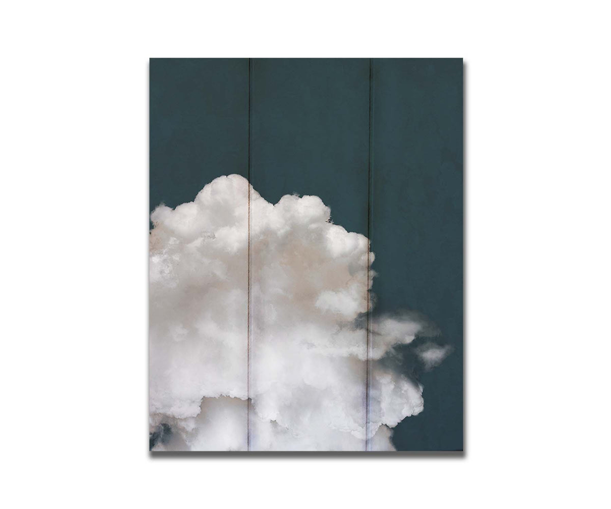 An edited photo of a fluffy white cloud against a deep navy blue background. Printed on a box board.