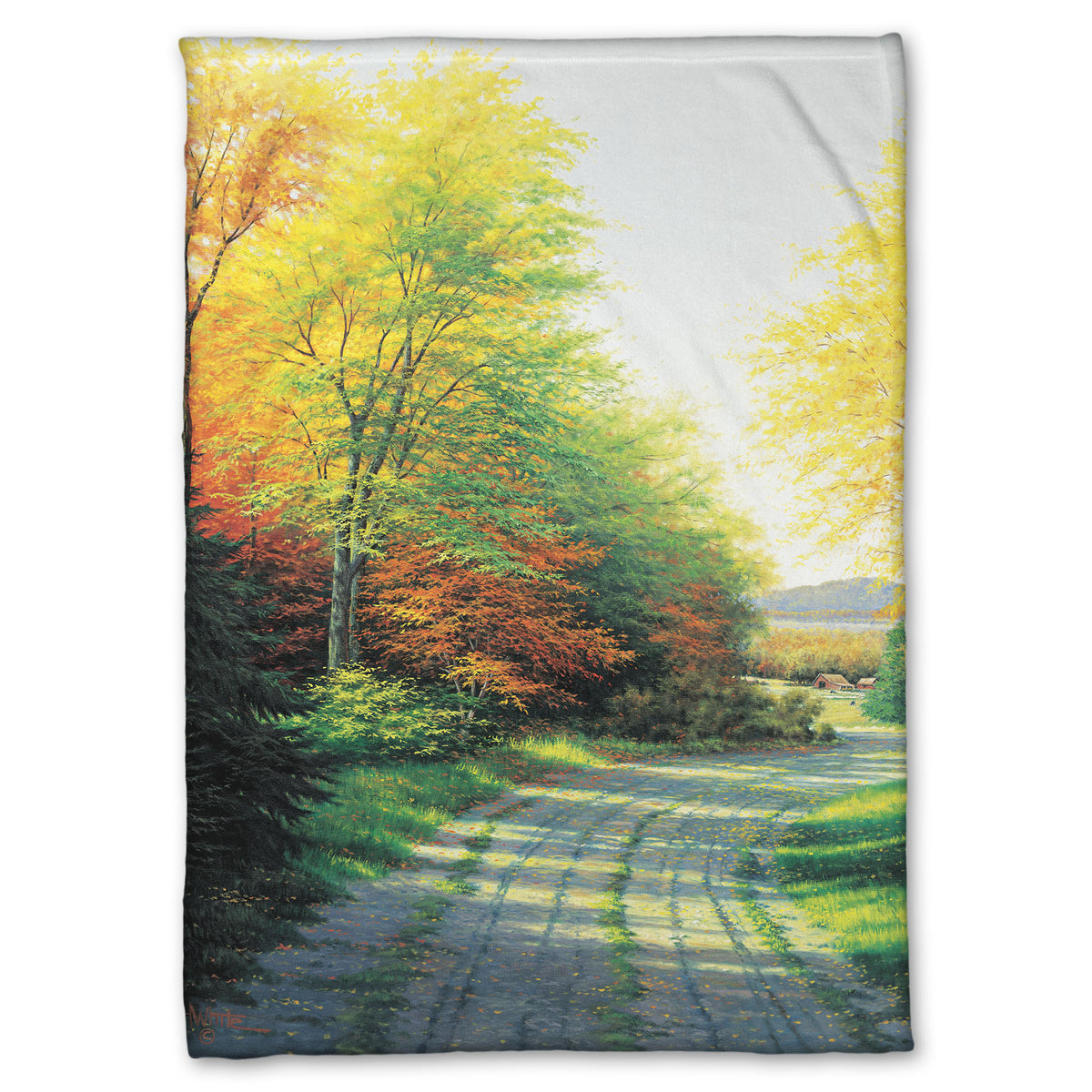 A fleece throw blanket designed with a painting looking down a country road, lined with both deciduous and coniferous trees. Several of the trees' leaves have turned orange and yellow due to fall.