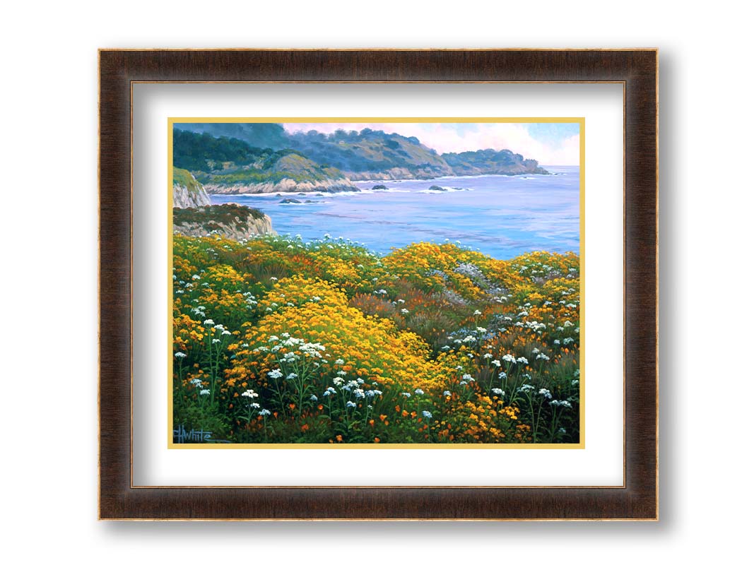 A painting of wildflowers growing in vibrant hues of yellow, white, orange, and blue, overlooking the sea from a cliff. Printed on paper, matted, and framed.