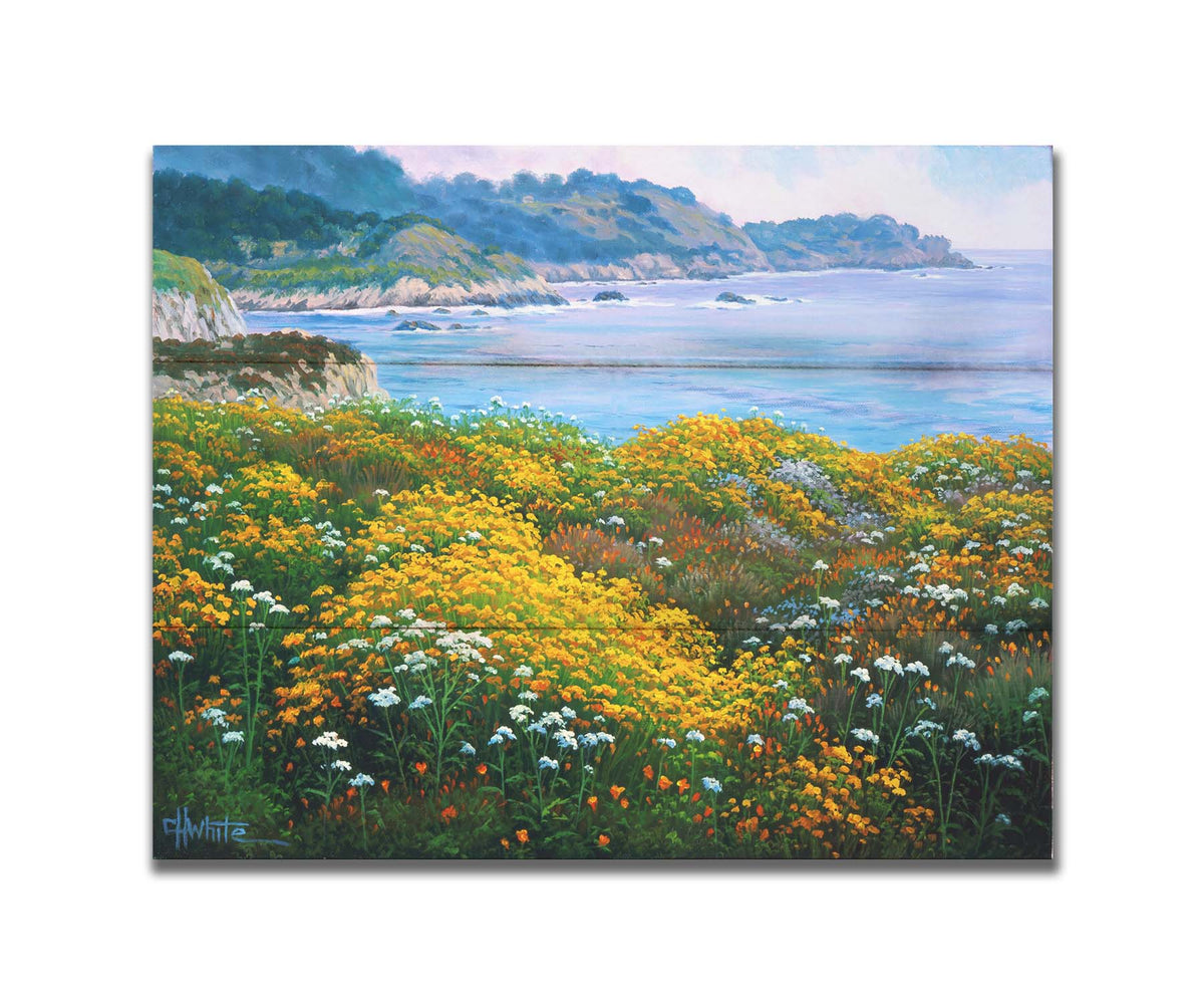 A painting of wildflowers growing in vibrant hues of yellow, white, orange, and blue, overlooking the sea from a cliff. Printed on a box board.