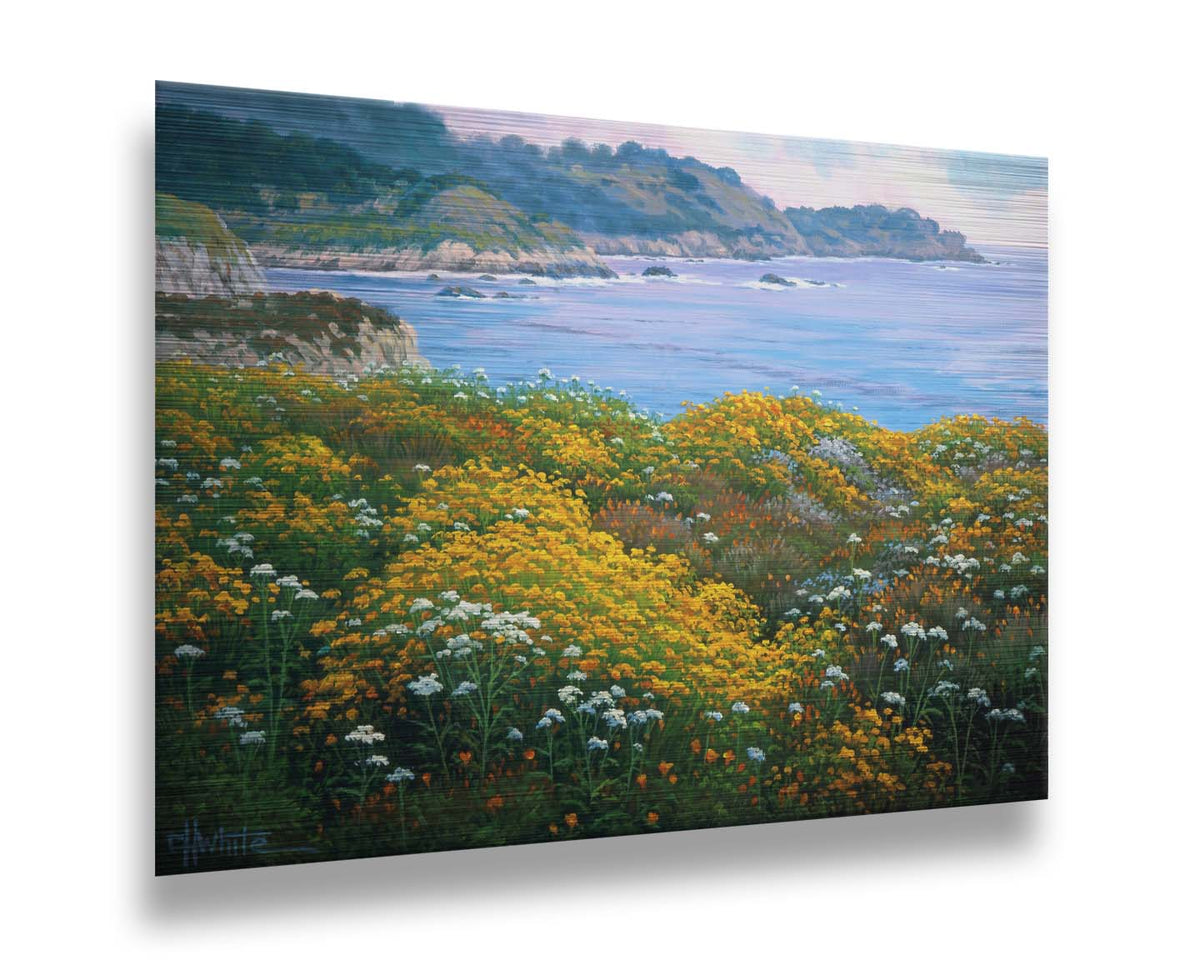 A painting of wildflowers growing in vibrant hues of yellow, white, orange, and blue, overlooking the sea from a cliff. Printed on metal.