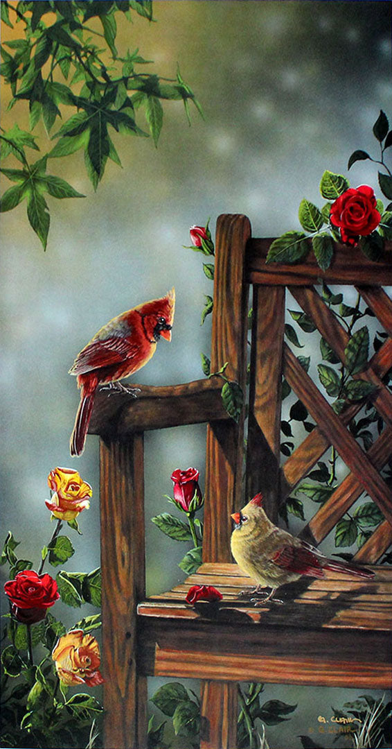A painting of two cardinals on a bench, surrounded by vibrant rose bushes. One is higher up on the arm rest, and they are looking at each other.