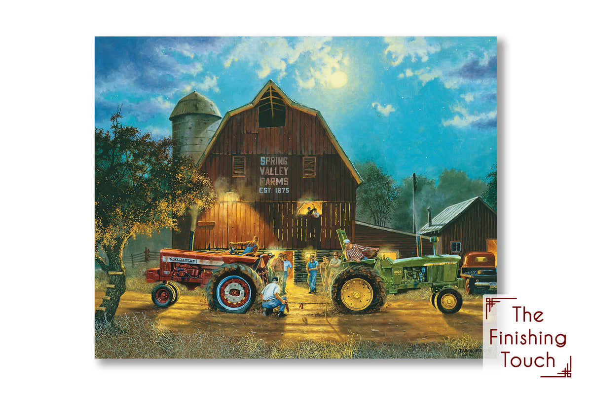 A painting of a scene of farmers engaged in a tractor tug of war, while a lively crowd cheers them on under the bright night sky at the barn.
