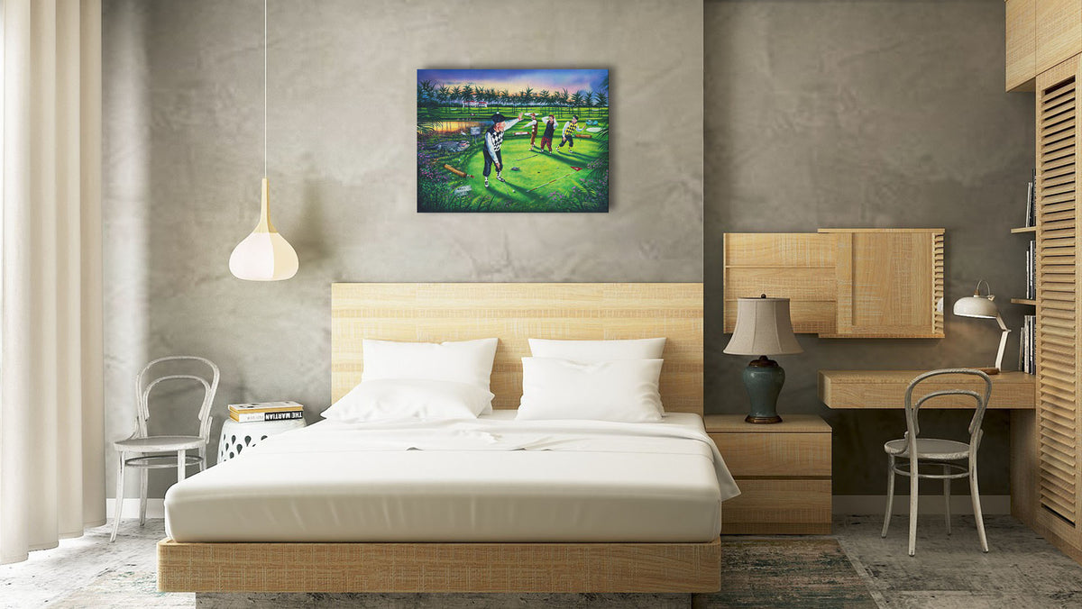 A painting hanging on a bedroom wall. A painting of a group of golfers, one shushing the others as he attempts a putt. Unknown to him, his friends are yelling because there is an alligator approaching. Printed on canvas.