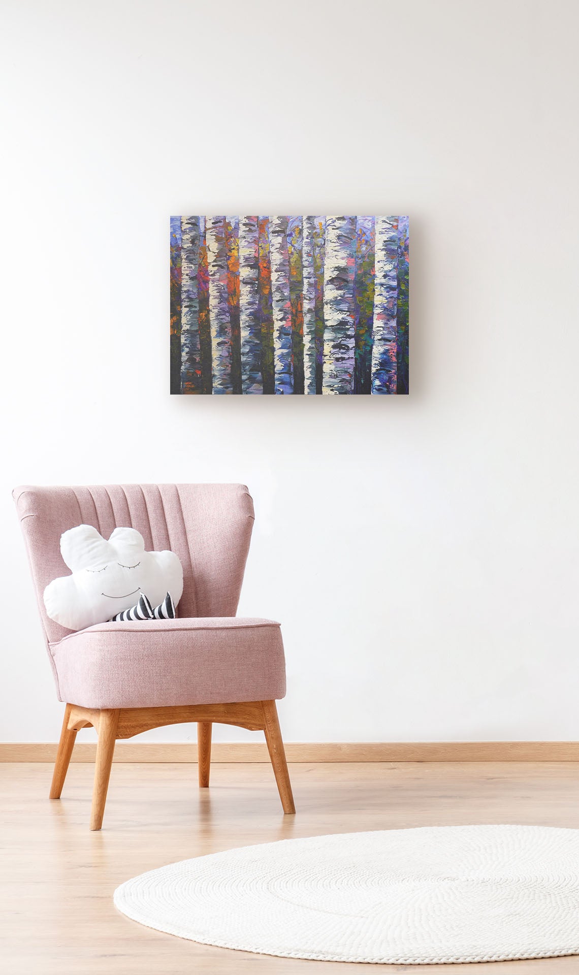 A painting hanging on a wall. An expressive impasto painting of a birch forest. Parallel white trunks shadowed with blue and purple are backed by a rainbow of leaves. Printed on canvas.