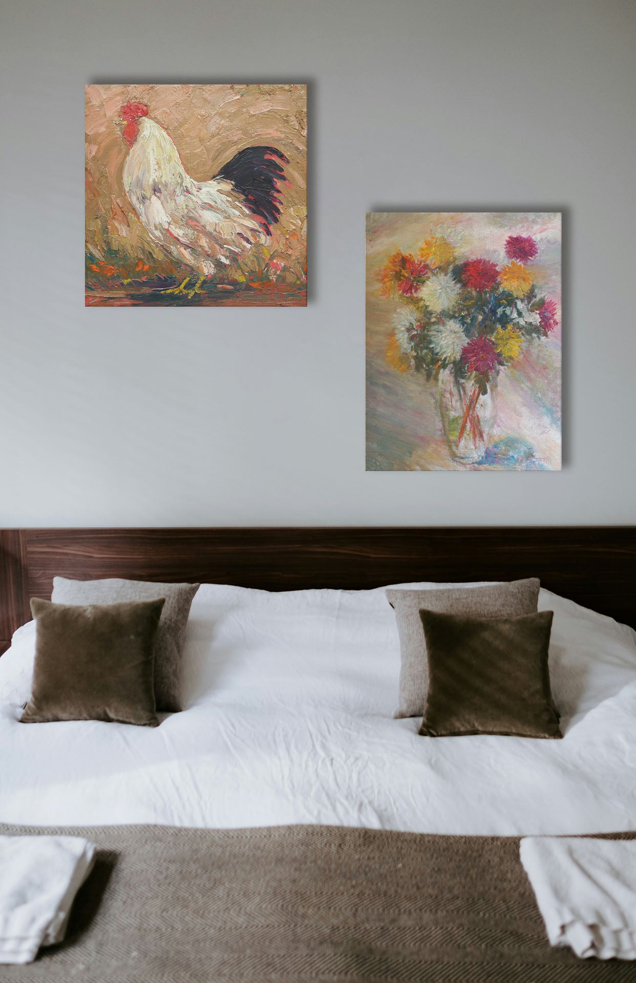Two paintings hanging on a bedroom wall. The first is an expressive painting of a rooster against a tan background. Printed on canvas. The second is a painting of a glass vase of red, white, and yellow flowers against a soft background. Printed on canvas.