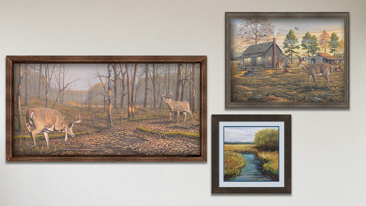 A collage of art in the designer Battleground package, including two famed canvas paintings about deer and a matted and framed painting of a creek through a field.