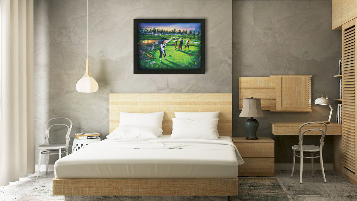A painting hanging on a bedroom wall. A painting of a group of golfers, one shushing the others as he attempts a putt. Unknown to him, his friends are yelling because there is an alligator approaching. Printed on canvas and framed.