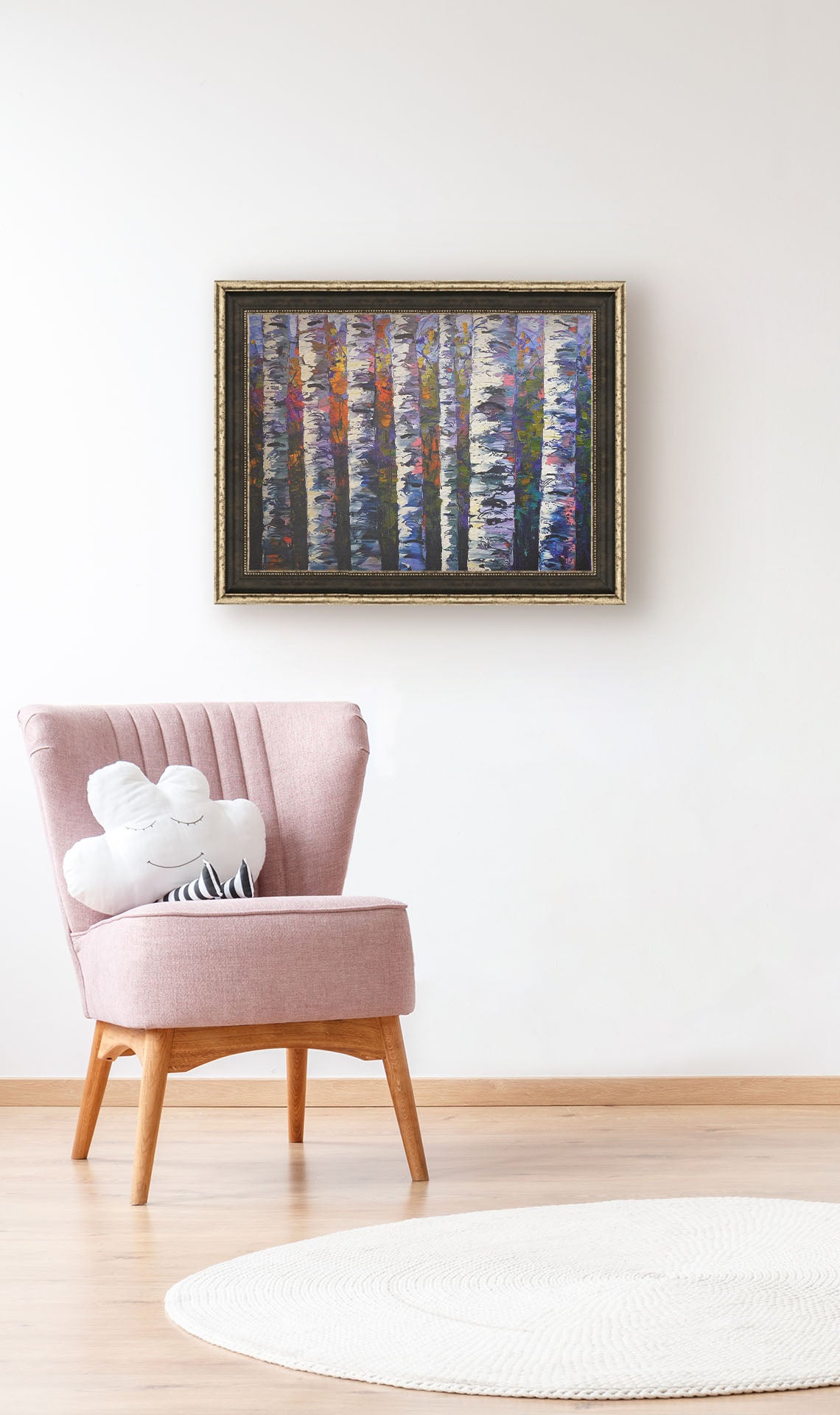 A painting hanging on a wall. An expressive impasto painting of a birch forest. Parallel white trunks shadowed with blue and purple are backed by a rainbow of leaves. Printed on canvas and framed.