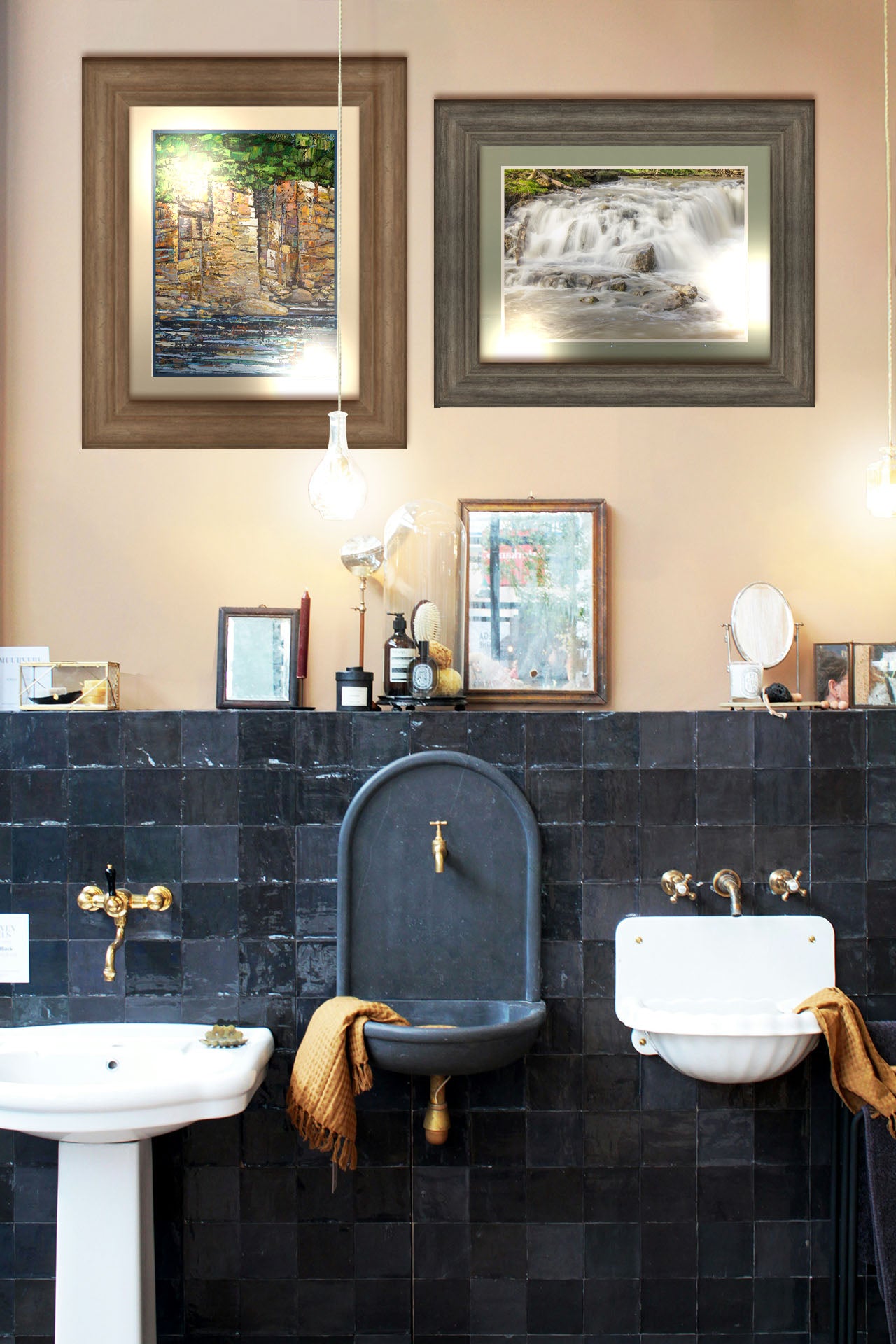 A painting and a photograph hanging on a bathroom wall. The first is a highly textured painting with visible brushstrokes, depicting a tan cliff face bordering water. At the top of the cliffs grows a dense forest. Printed on a paper, matted, and framed. The second is a photograph of a small river waterfall, only a few feet high. The use of a slow shutter speed technique gives the water a soft, gentle appearance. Printed on paper, matted, and framed.