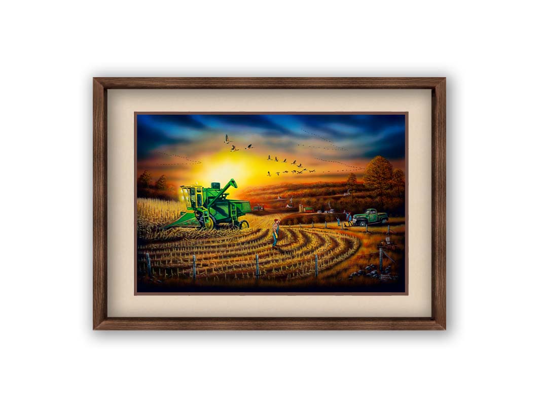 A painting of a harvester at work, gracefully cutting through fields of golden corn stalks. Geese fly overhead, illuminated by the sun on the horizon. Printed on paper, matted, and framed.