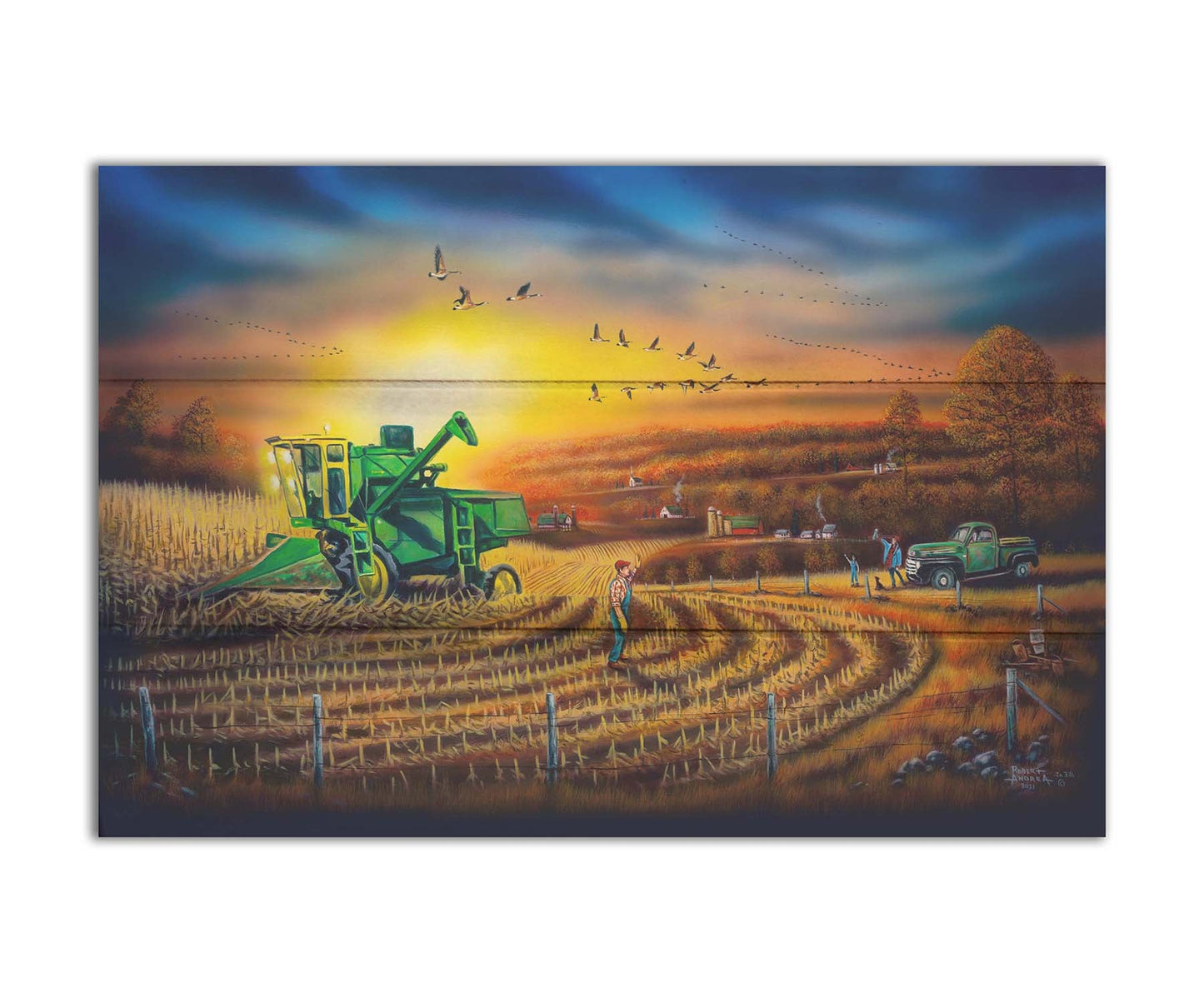 A painting of a harvester at work, gracefully cutting through fields of golden corn stalks. Geese fly overhead, illuminated by the sun on the horizon. Printed on a box board.