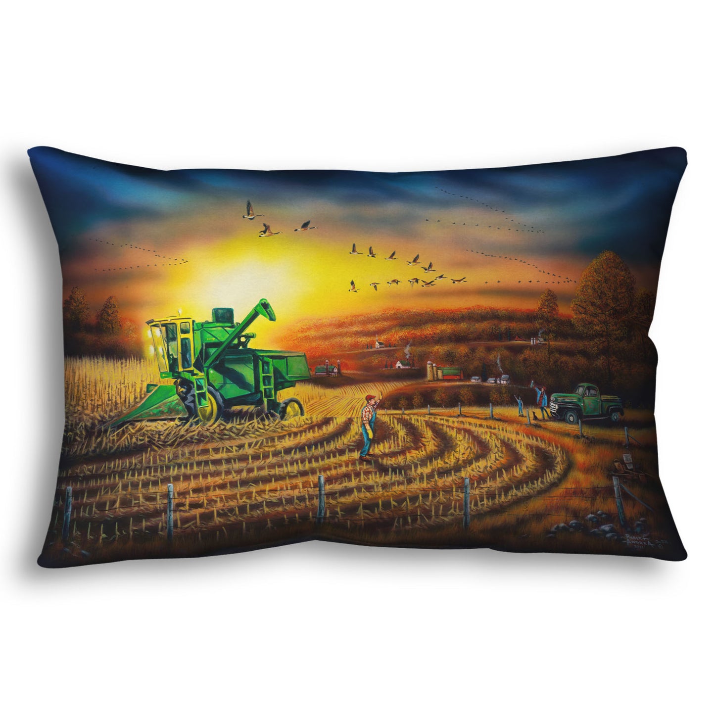 Throw pillow with a scenic design of a farm landscape, with a harvester stopped in a partially harvested field of corn.
