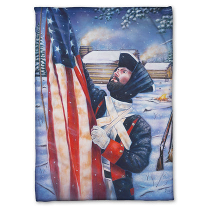 Coral fleece blanket designed with a soldier holding an American flag in a snowy landscape.