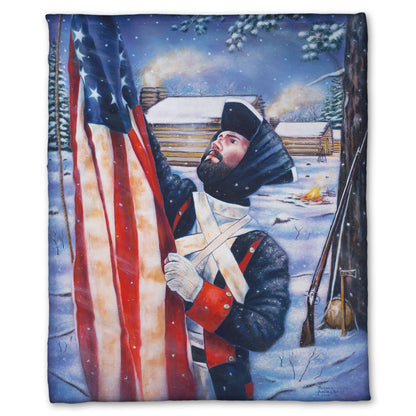 Coral fleece blanket designed with a soldier holding an American flag in a snowy landscape.
