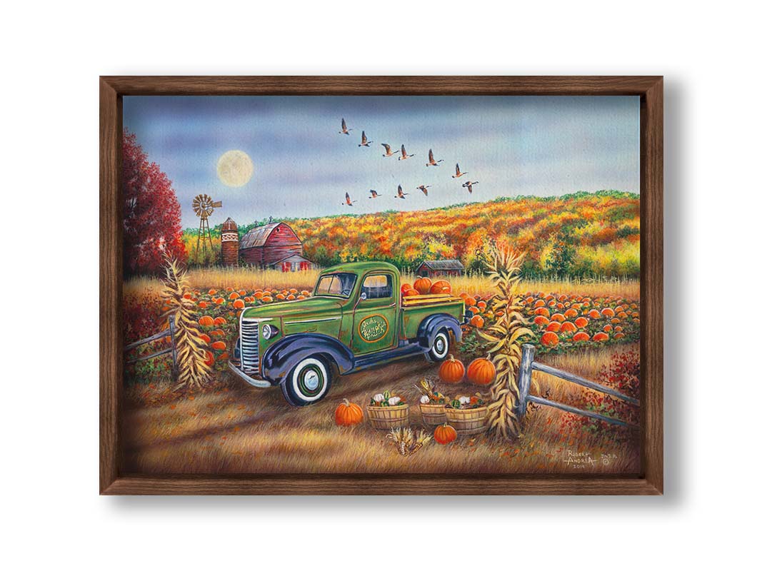 A painting of a farm, featuring a field of pumpkins and a field of corn. There is a forest of yellow, orange, red, and green fall trees in the background, and geese fly overhead. Printed on canvas and framed.