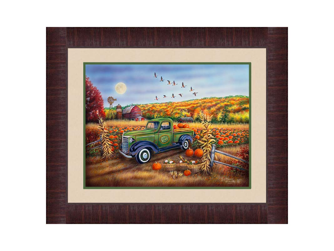 A painting of a farm, featuring a field of pumpkins and a field of corn. There is a forest of yellow, orange, red, and green fall trees in the background, and geese fly overhead. Printed on paper, matted, and framed.