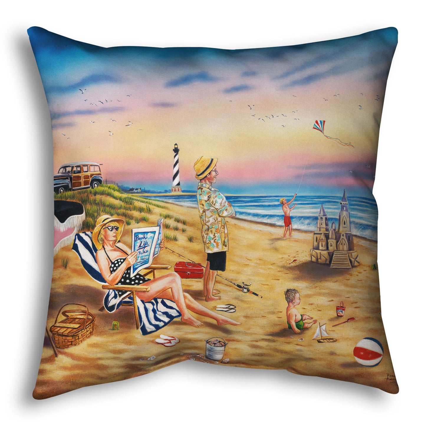 A throw pillow designed with a painting of a family vacationing on the beach. The adults relax while the children play, with one in the sand and another flying a kite with their dog.