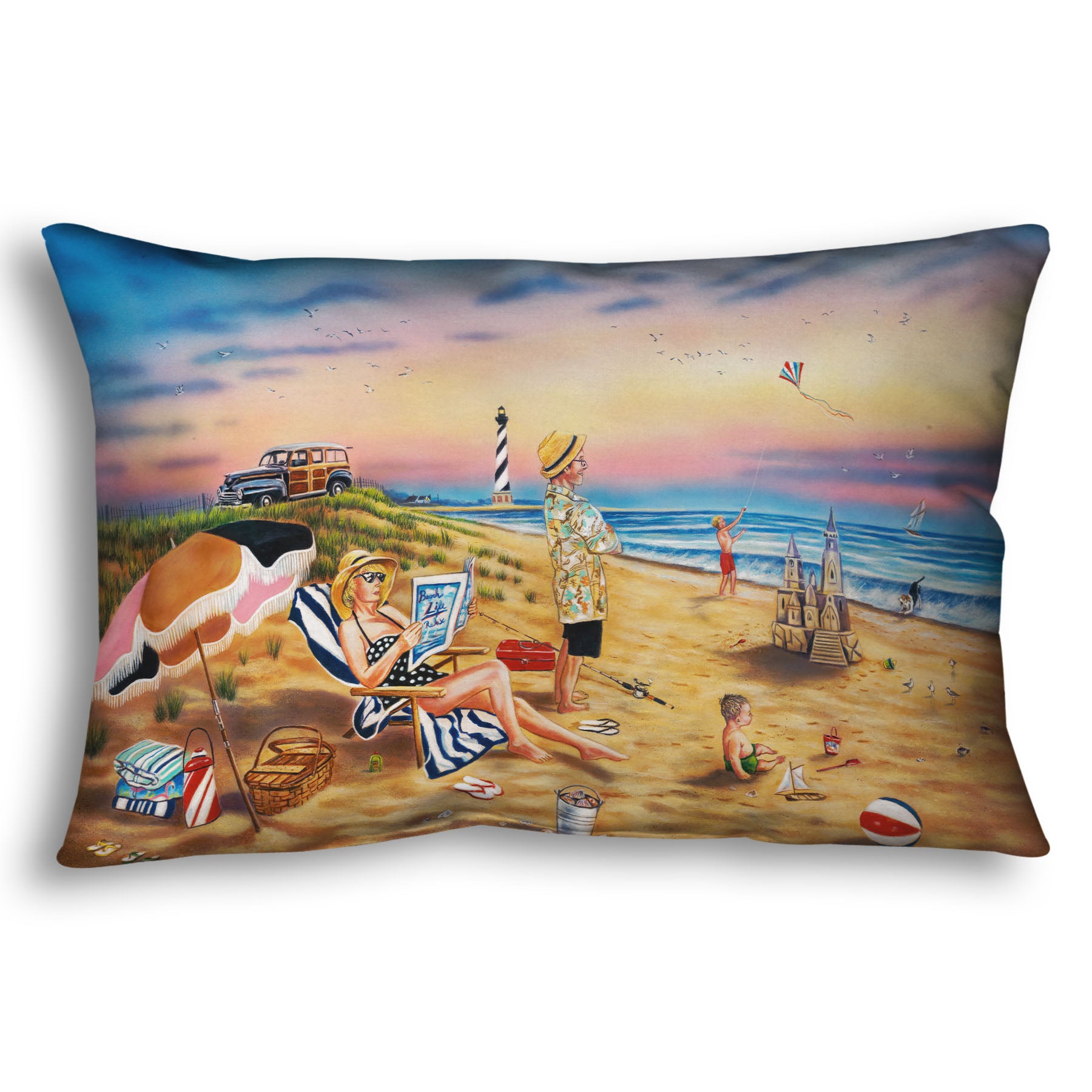 A throw pillow designed with a painting of a family vacationing on the beach. The adults relax while the children play, with one in the sand and another flying a kite with their dog.