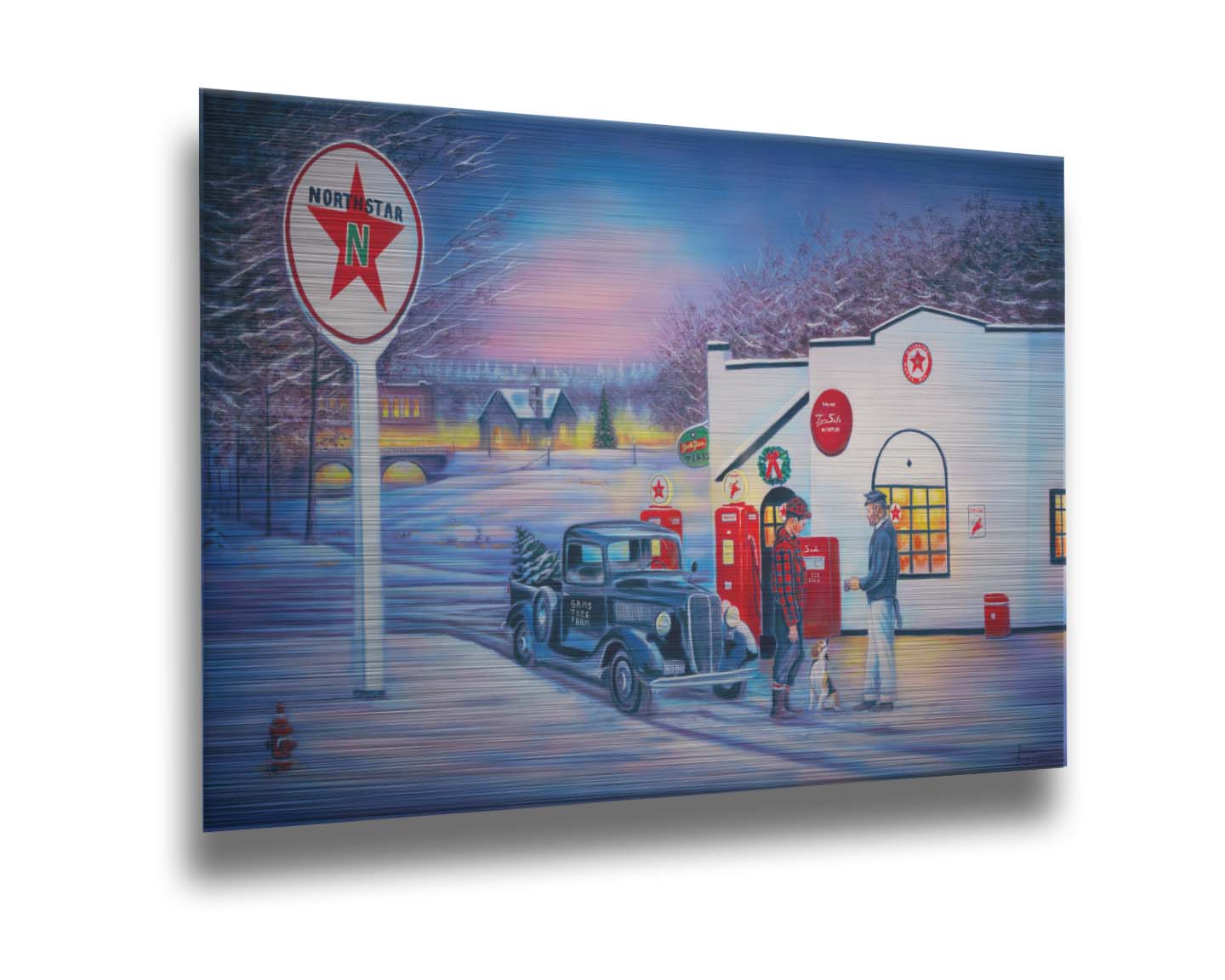 A painting of a small town scene in the snowy winter. Two people talk outside of a gas station beside a dog and an old car carrying a Christmas tree. Printed on metal.