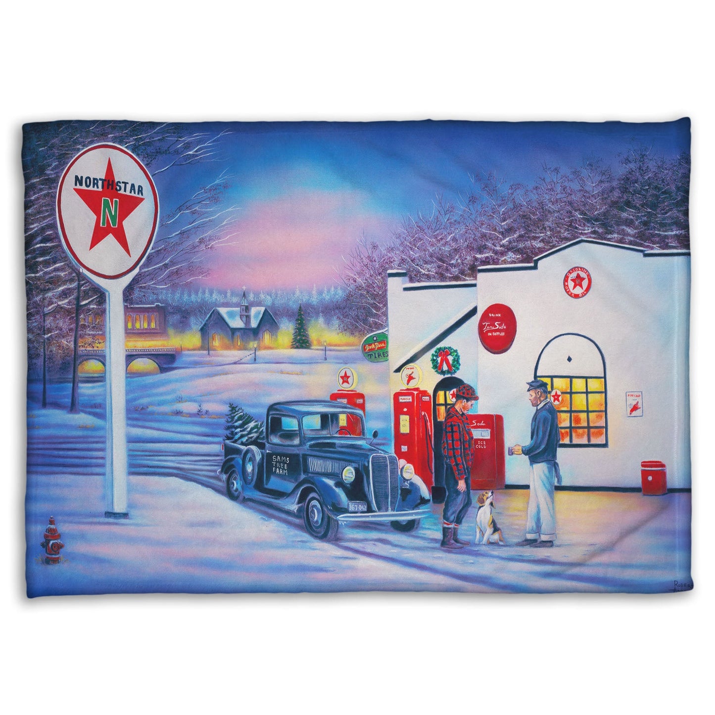 A coral fleece blanket decorated with a 1950s Americana scene, with a vintage truck refueling at a Northstar gas station.