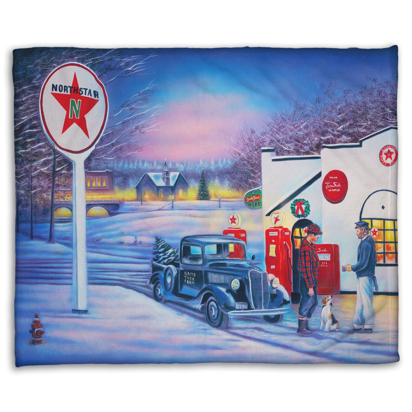 A coral fleece blanket decorated with a 1950s Americana scene, with a vintage truck refueling at a Northstar gas station.