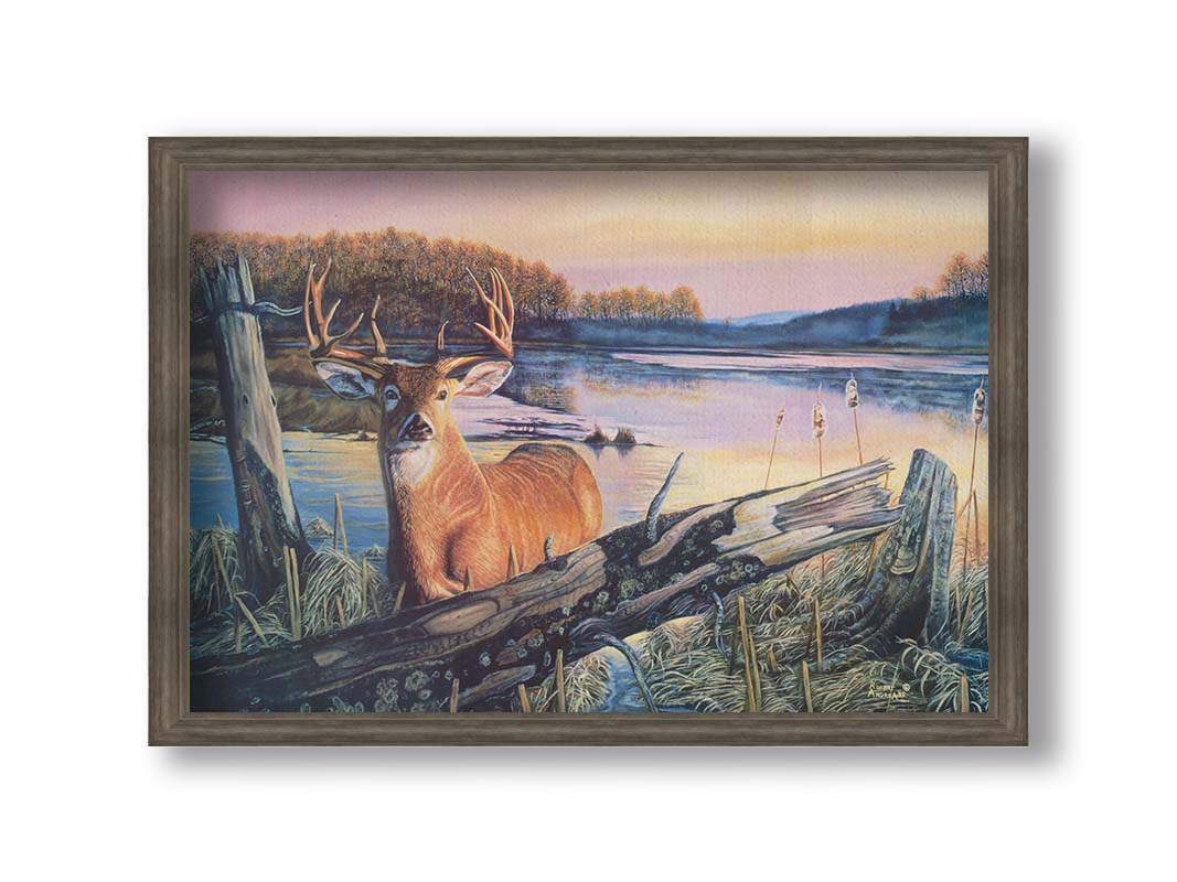 Painting of a deer in front of a lake reflecting the morning sky. Printed on canvas and framed.