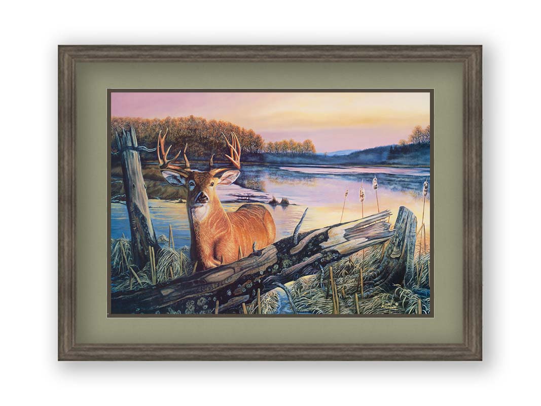 Painting of a deer in front of a lake reflecting the morning sky. Printed on paper, matted, and canvas.