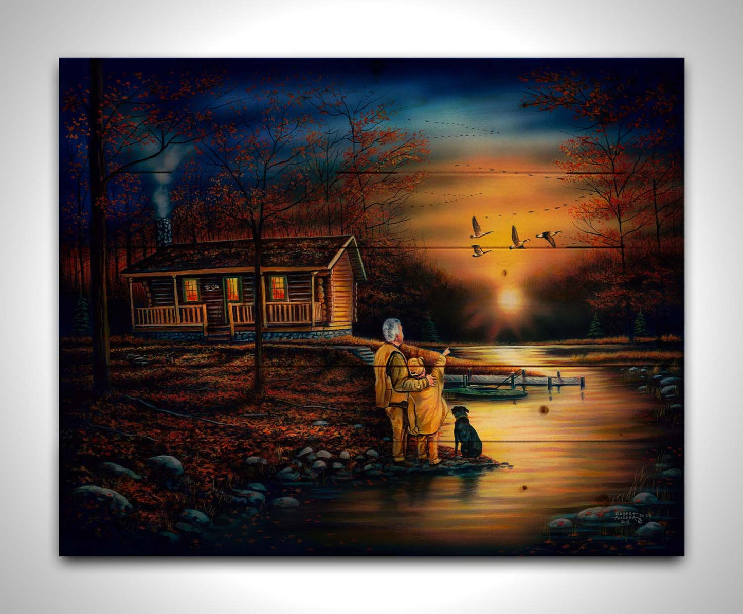 A painting of a man and a child standing by a river and cabin. They arre watching geese fly ovehead at sunset. Printed on a wood pallet.