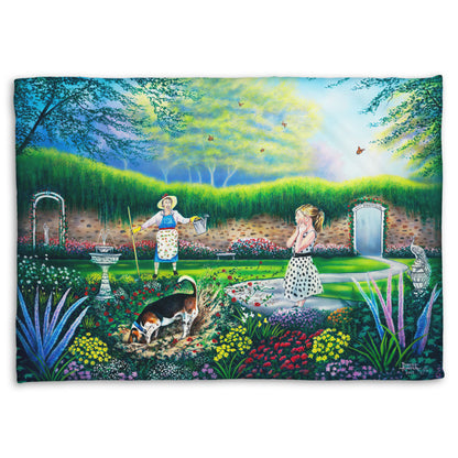 A coral fleece throw blanket designed with a painting of a beautiful garden, but a dog is digging up the rose bushes, ruining them. The woman gardening and a child are looking on in shock.