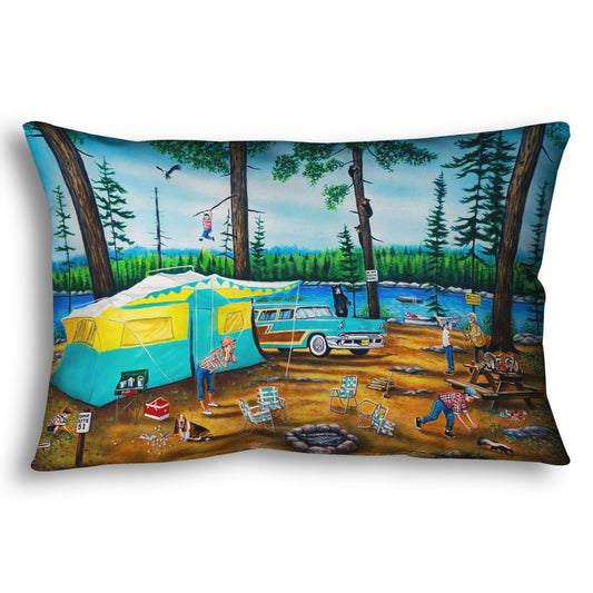 A throw pillow designed with a painting of a family camping trip gone awry. The campsite is bombarded by bears, raccoons, and skunks while the children dangle from trees, play in poison ivy, and chase the wild animals.