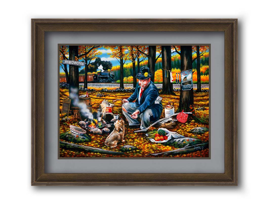 A painting of a man sitting on a log at a campfire in the woods strewn with fall leaves. He is feeding a little dog. A train is passing in the background. Printed on paper, matted, and framed.