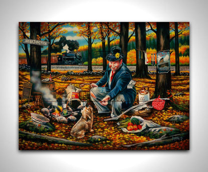 A painting of a man sitting on a log at a campfire in the woods strewn with fall leaves. He is feeding a little dog. A train is passing in the background. Printed on a wood pallet.