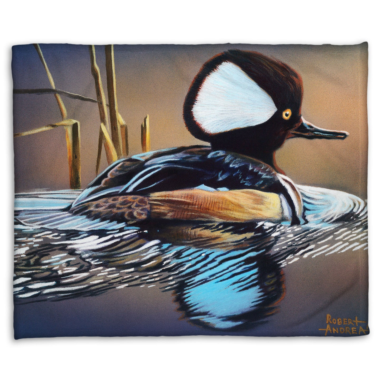 A coral fleece blanket decorated with the design of a hooded merganser duck, floating on the water with its reflection rippling below.
