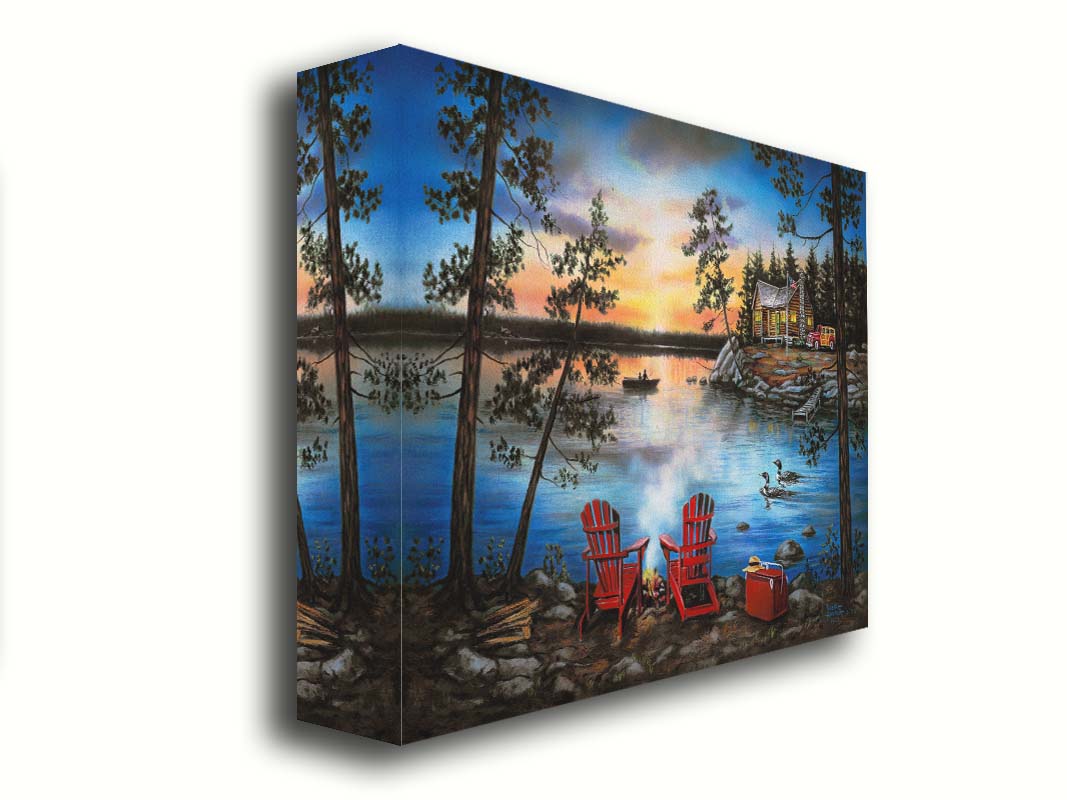 A painting of a lake at sunset, with a campfire in the foreground. Two loons drift across the water, as well as two fishers. Printed on canvas.