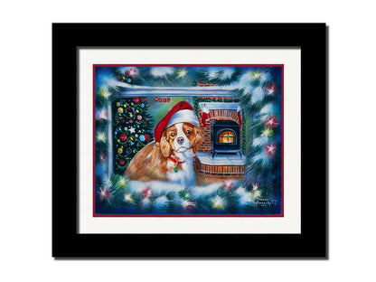 A painting of a little dog with a red santa hat, sitting inside near a fireplace. Printed on paper, matted, and framed.