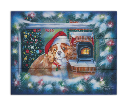 A painting of a little dog with a red santa hat, sitting inside near a fireplace. Printed on a box board.