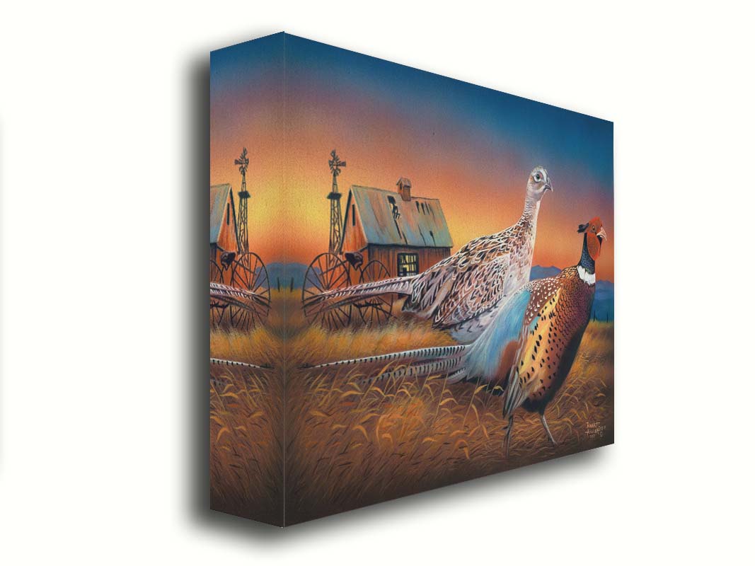 A painting of two pheasants, walking through golden grasses against a colorful sunset. Printed on canvas.