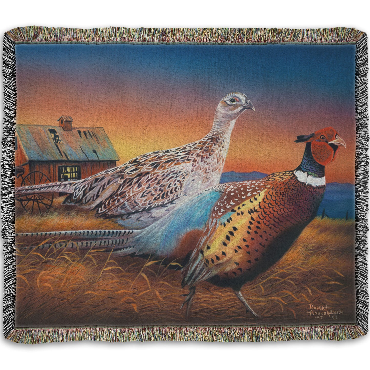 Woven throw blanket designed with a painting of two pheasants, walking through golden grasses against a colorful sunset.